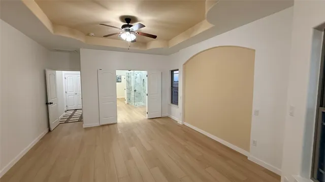 a view of a livingroom with furniture and an entryway