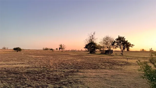 a view of a pool with outdoor space