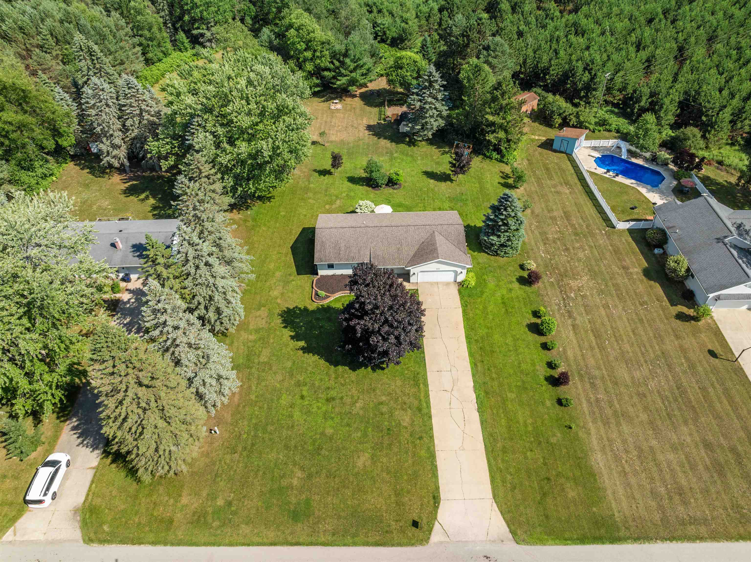 4052 Benson Road Cadillac, MI 49601 - Photo 2 of 42 1936352-904337bc-634e-4f94-967d-e47ff6c4b74b.JPG