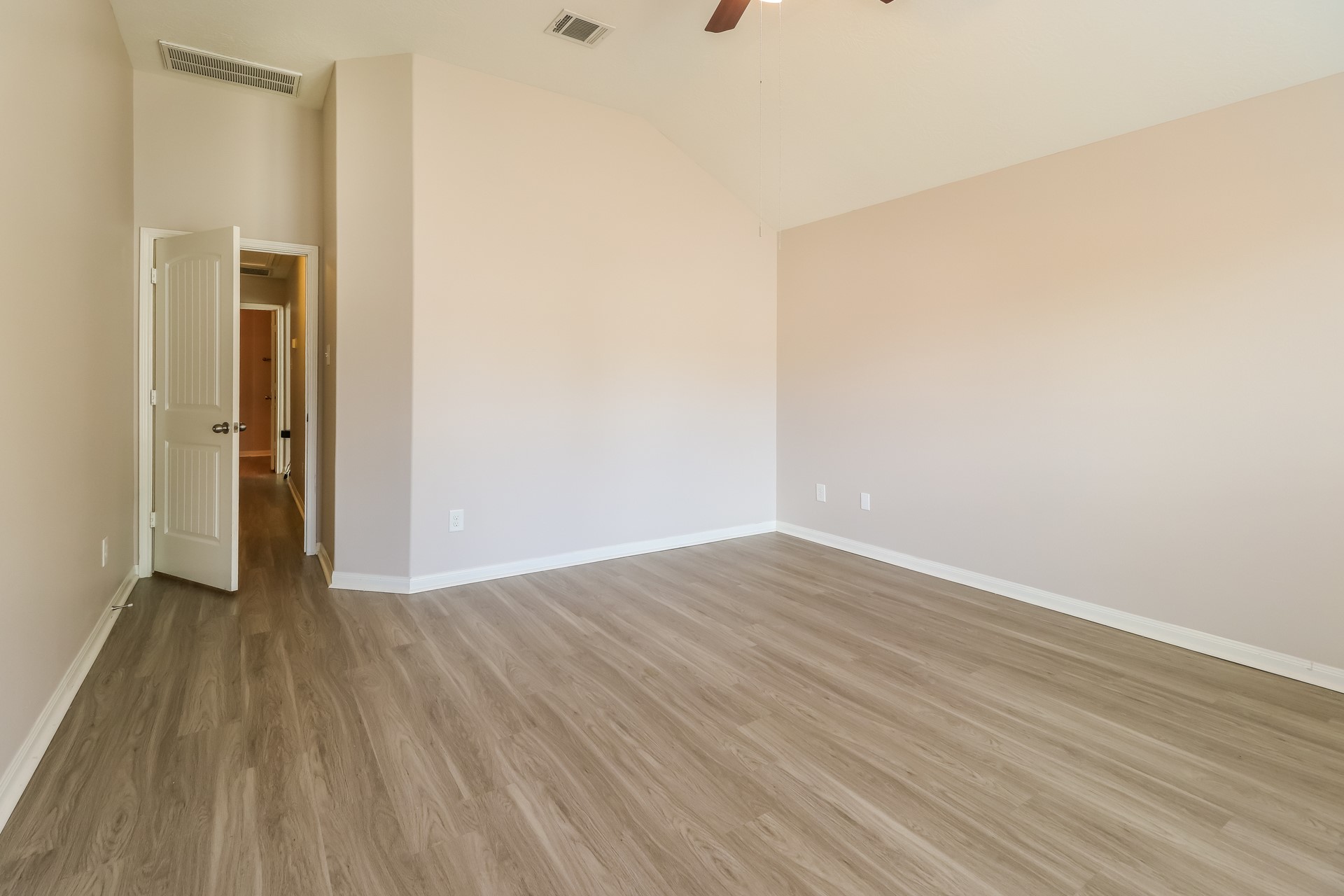 603 Lake View Drive Montgomery, TX 77356 - Photo 9 of 16 a view of an empty room with wooden floor