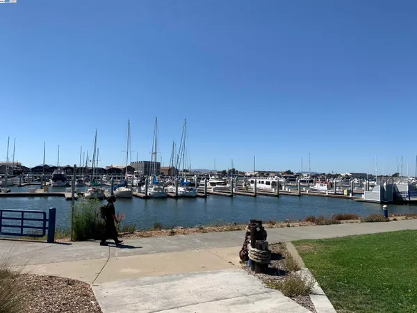 an aerial view of residential building and ocean