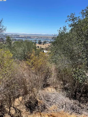 a view of a field with an outdoor space
