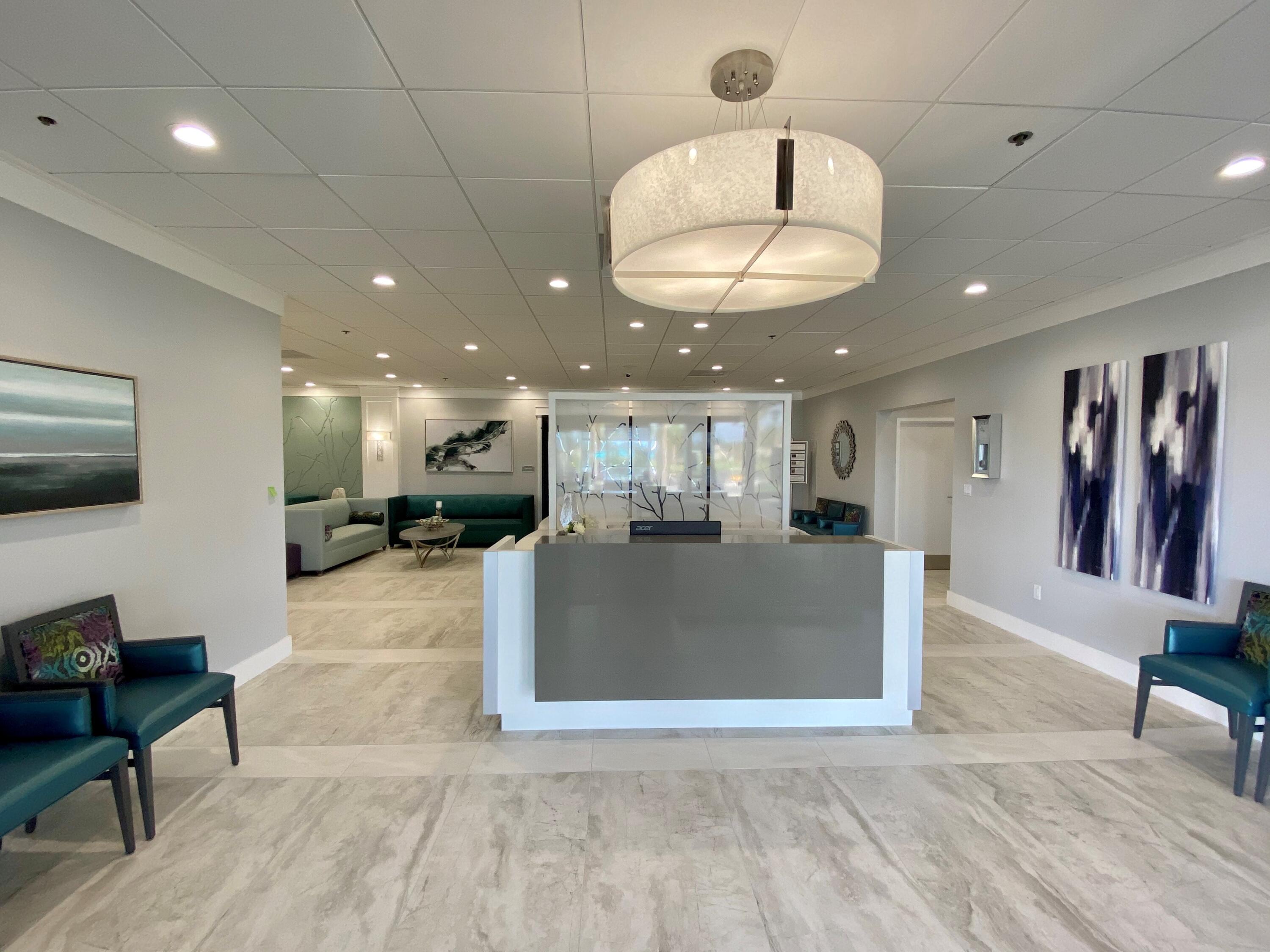 77 Normandy B Delray Beach, FL 33484 - Photo 28 of 34 a view of a living room and a large window