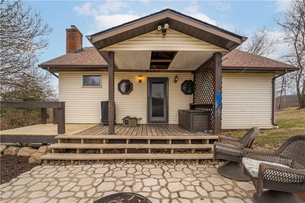 205 Nilan Hill Road Point Marion, PA 15474 - Photo 1 of 22 a front view of a house with a yard