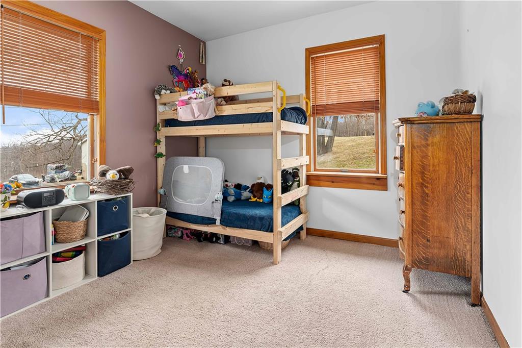 205 Nilan Hill Road Point Marion, PA 15474 - Photo 14 of 22 a bedroom with furniture and a window