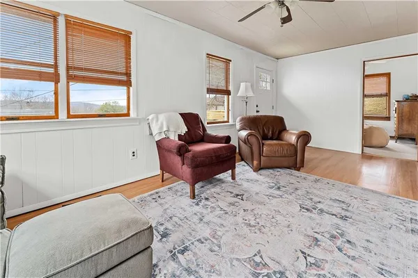 a living room with furniture and a window