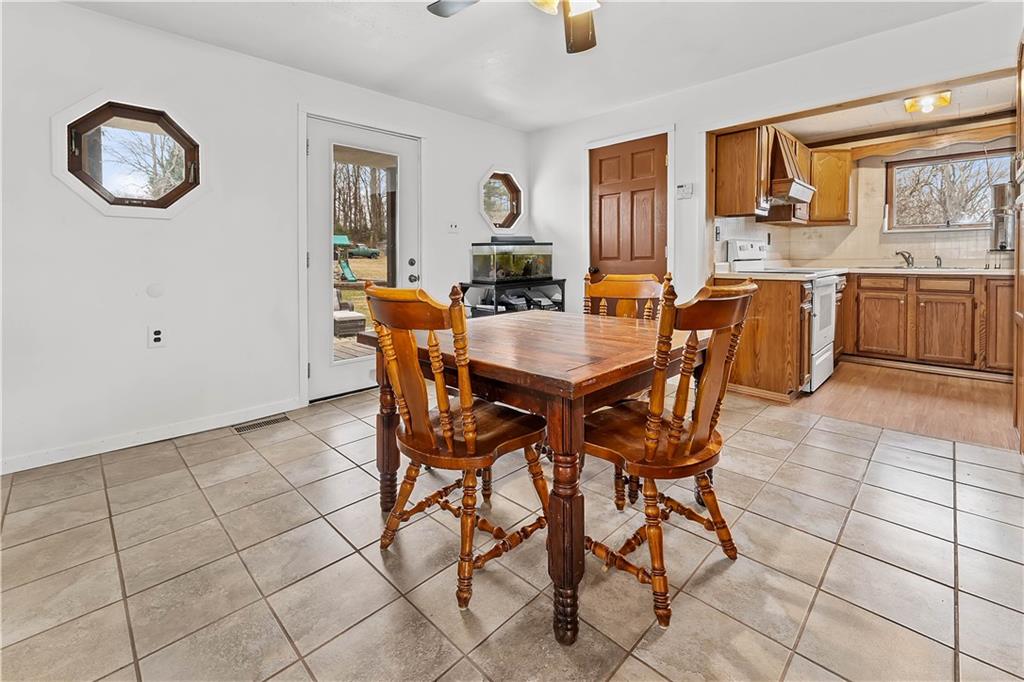 205 Nilan Hill Road Point Marion, PA 15474 - Photo 8 of 22 a view of a dining room with furniture