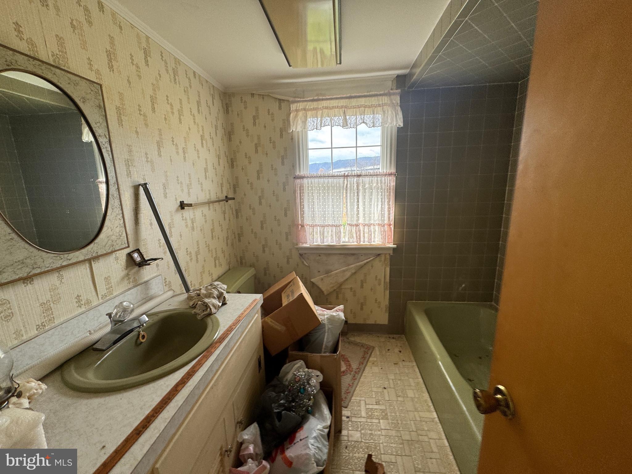 19108 Spring Run Road Spring Run, PA 17262 - Photo 19 of 24 a bathroom with a sink and a mirror