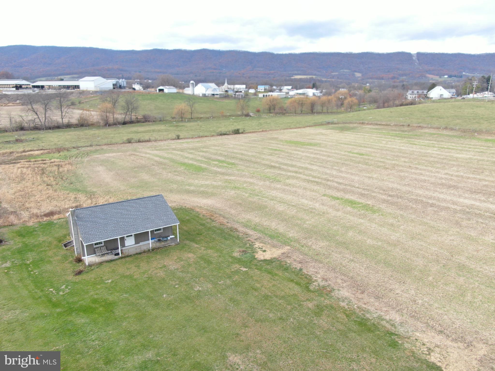 19108 Spring Run Road Spring Run, PA 17262 - Photo 4 of 24 a view of a lake with a mountain