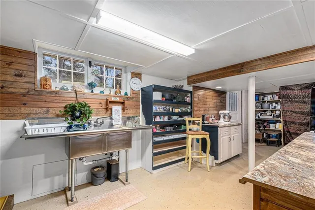 a view of a workspace with furniture