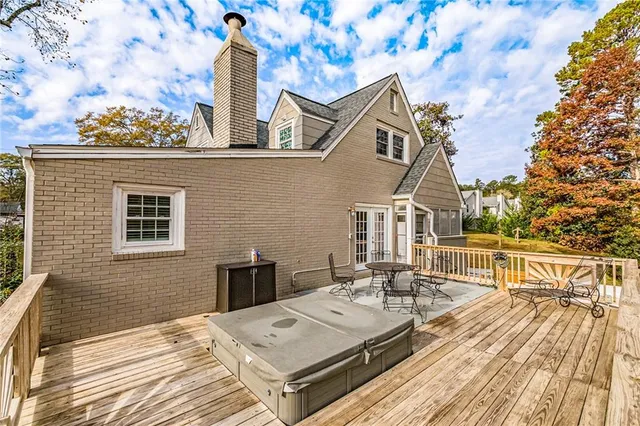 a terrace with a table and chairs