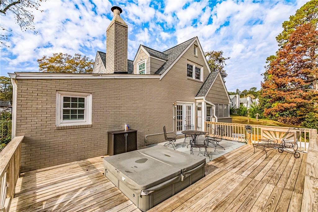 139 Myrtle Street Toccoa, GA 30577 - Photo 31 of 42 a terrace with a table and chairs