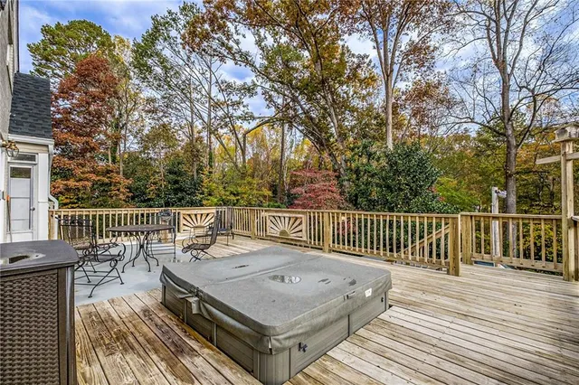 a view of a wooden deck with a bench