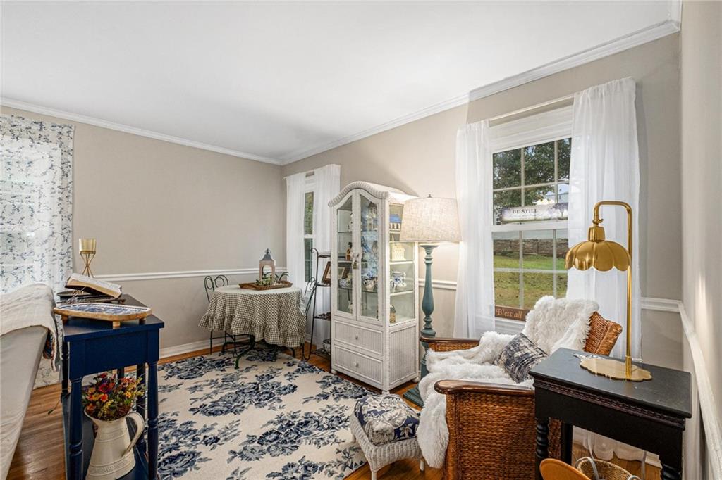 139 Myrtle Street Toccoa, GA 30577 - Photo 7 of 42 a view of a workspace with furniture and a window