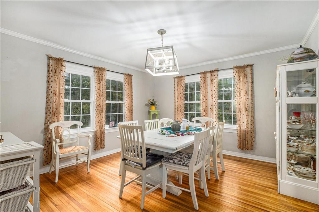 139 Myrtle Street Toccoa, GA 30577 - Photo 10 of 42 a view of a dining room with furniture windows and wooden floor