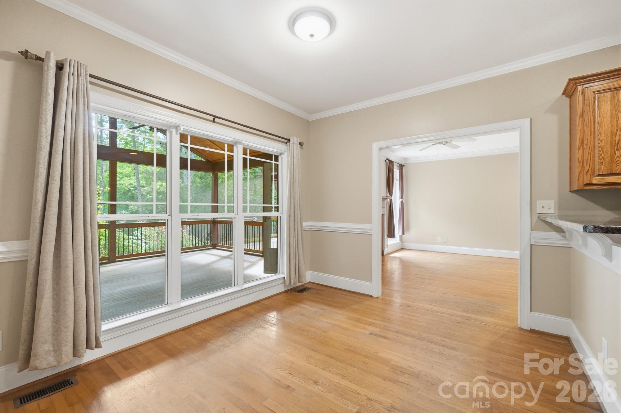 2811 Belk Mill Road Wingate, NC 28174 - Photo 14 of 36 a view of an empty room and window