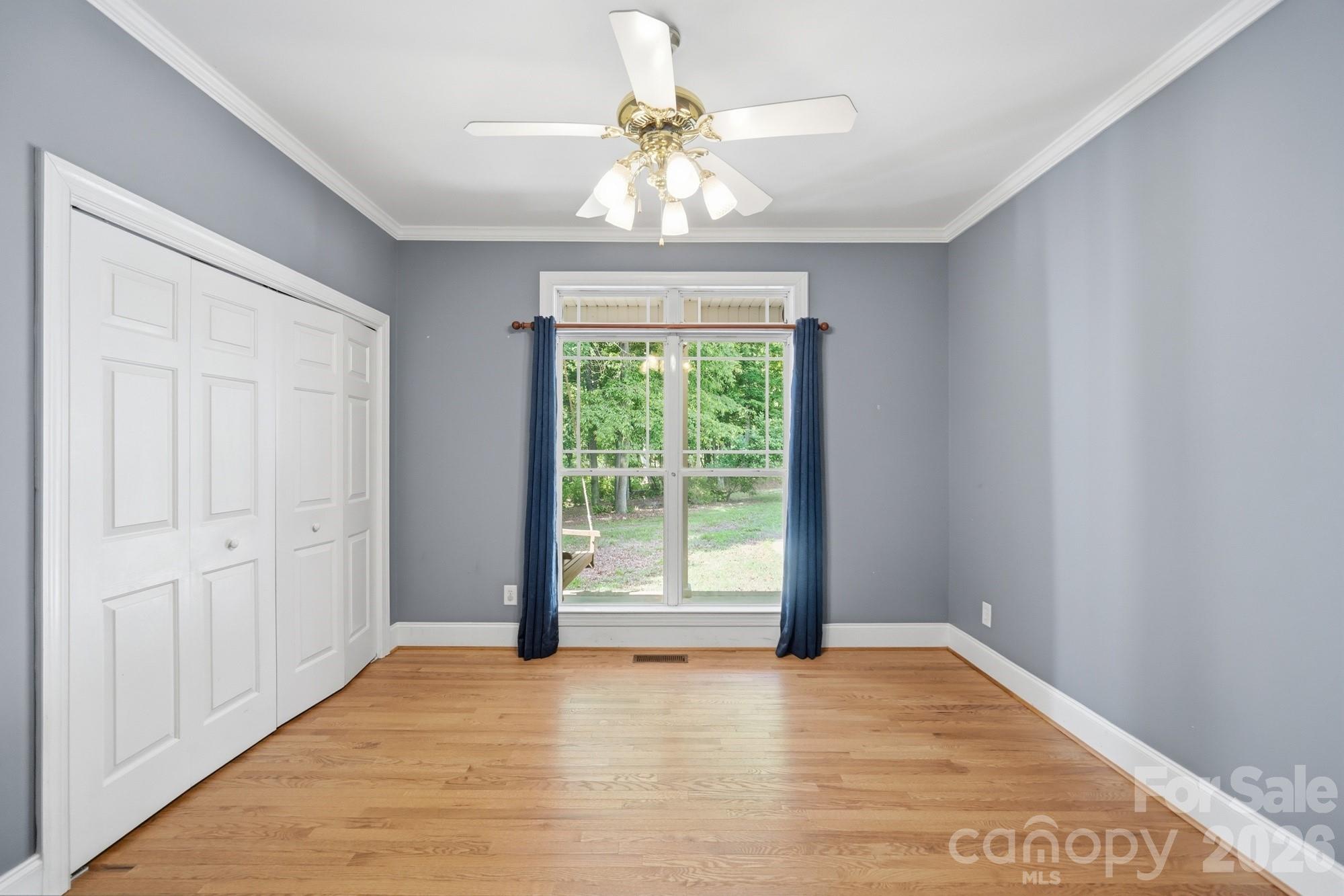 2811 Belk Mill Road Wingate, NC 28174 - Photo 23 of 36 a view of an empty room with a window