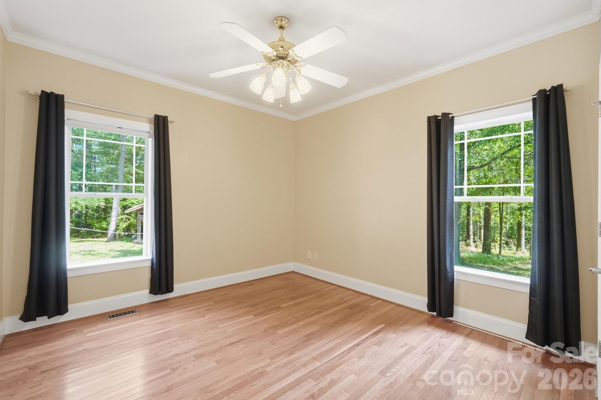 2811 Belk Mill Road Wingate, NC 28174 - Photo 24 of 36 a view of an empty room with a window