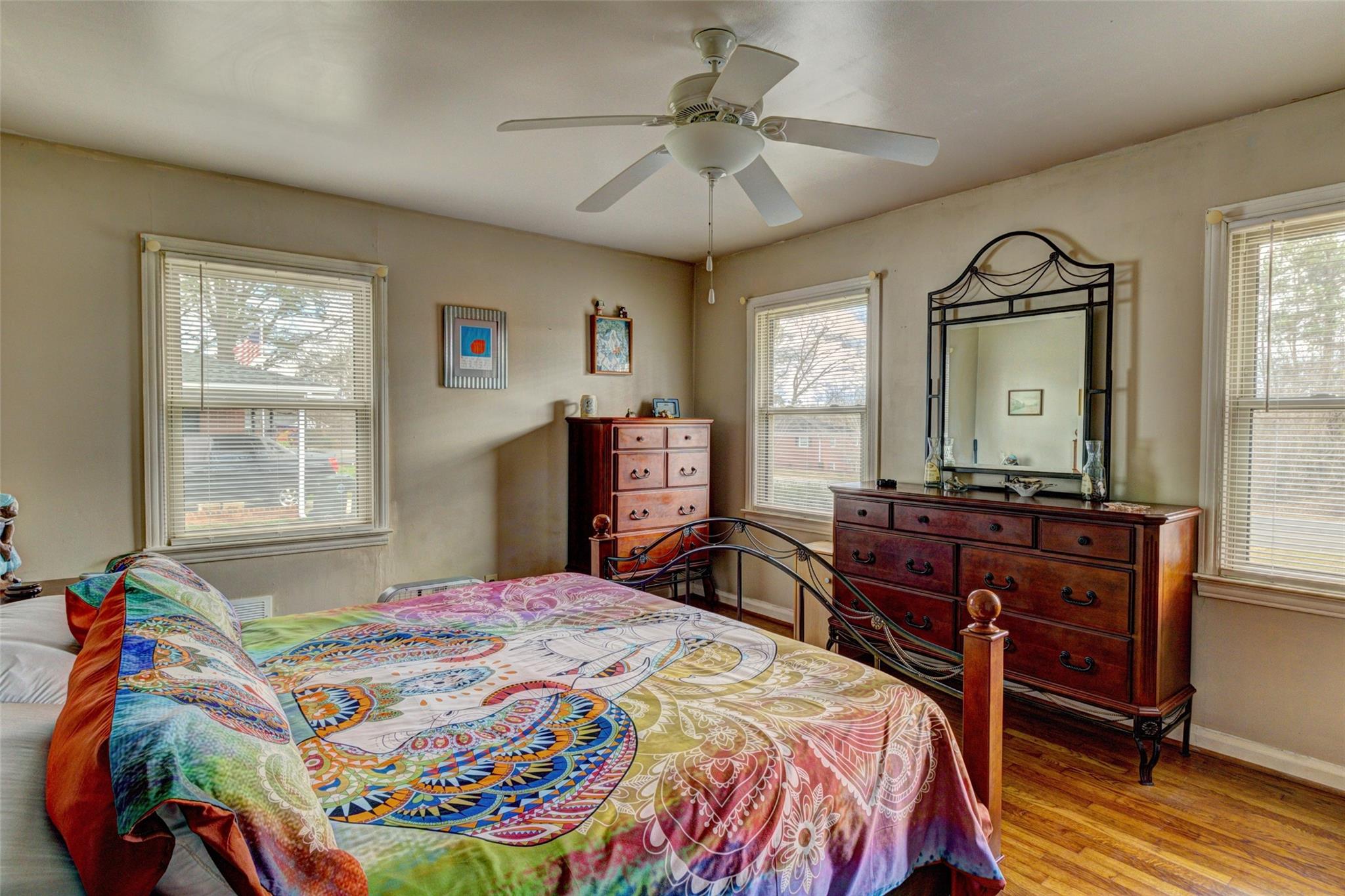 443 Roy Eaker Road Cherryville, NC 28021 - Photo 11 of 15 a bedroom with a bed and a chandelier