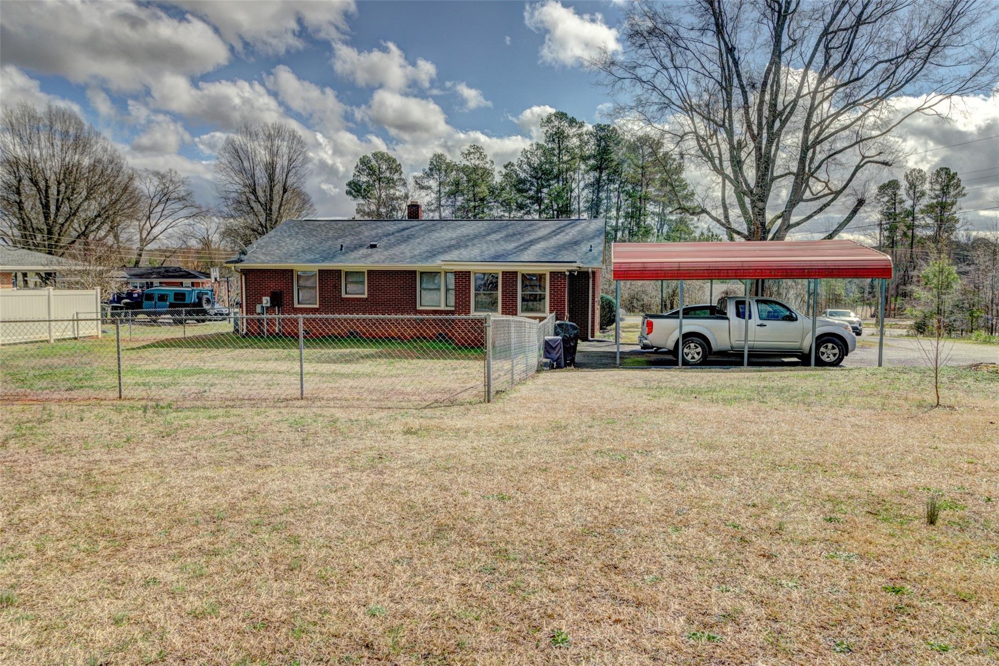 443 Roy Eaker Road Cherryville, NC 28021 - Photo 13 of 15 a car parked in front of a house