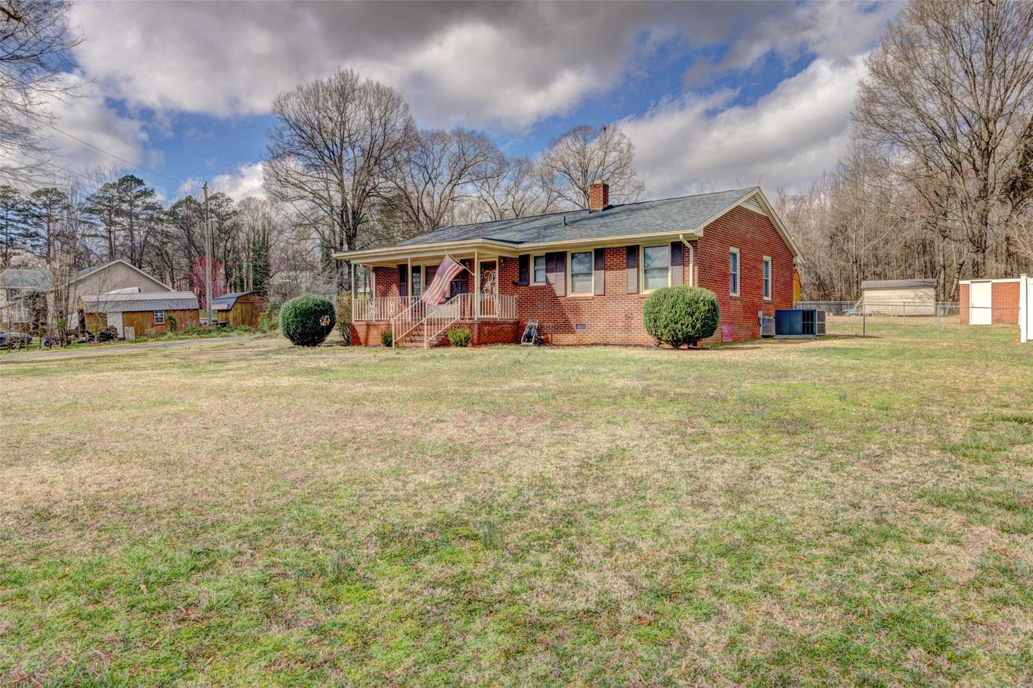 443 Roy Eaker Road Cherryville, NC 28021 - Photo 2 of 15 a view of a yard in front of a house