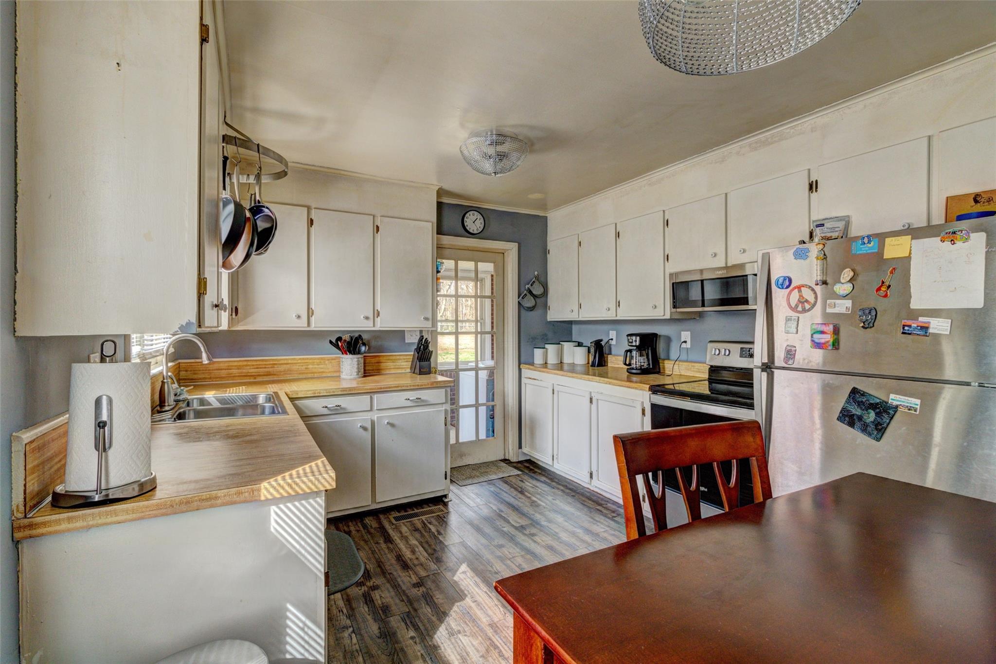 443 Roy Eaker Road Cherryville, NC 28021 - Photo 5 of 15 a kitchen with refrigerator and stove