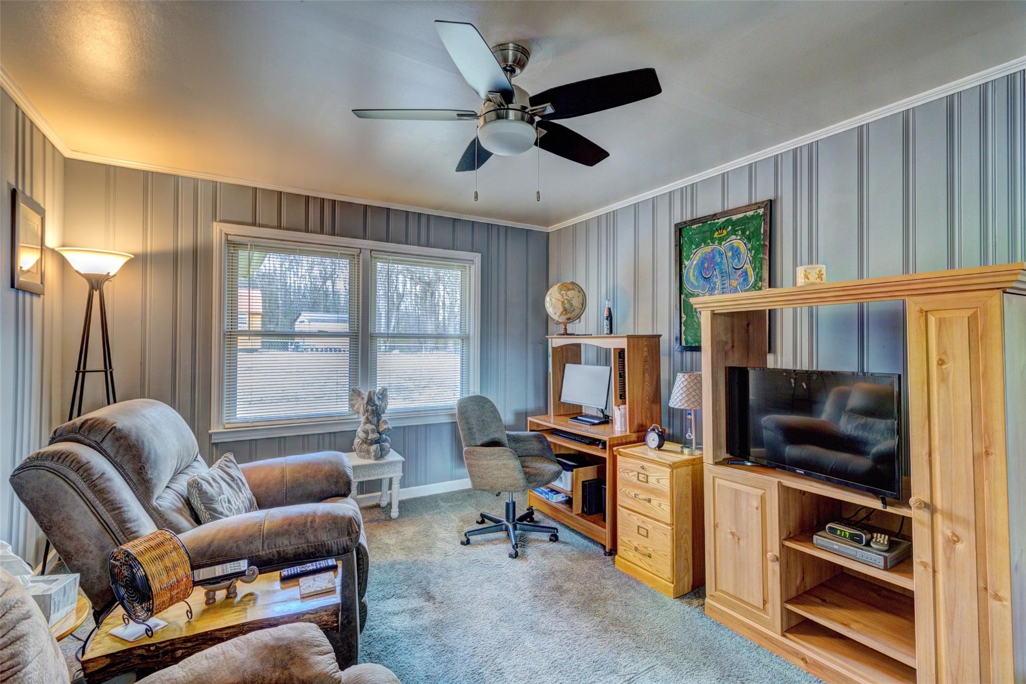 443 Roy Eaker Road Cherryville, NC 28021 - Photo 6 of 15 a work room with furniture and a flat screen tv