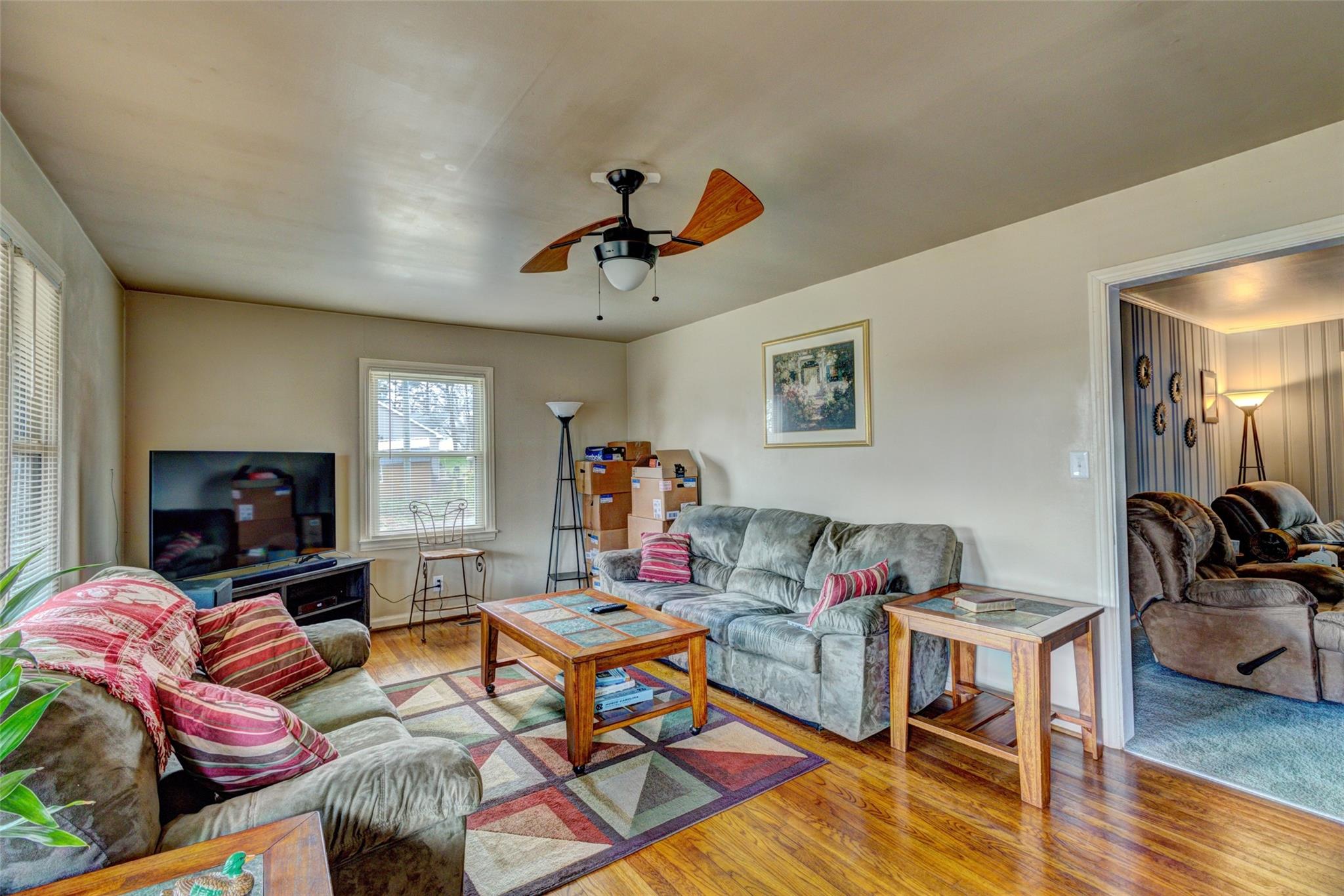 443 Roy Eaker Road Cherryville, NC 28021 - Photo 8 of 15 a living room with furniture a flat screen tv and a fireplace