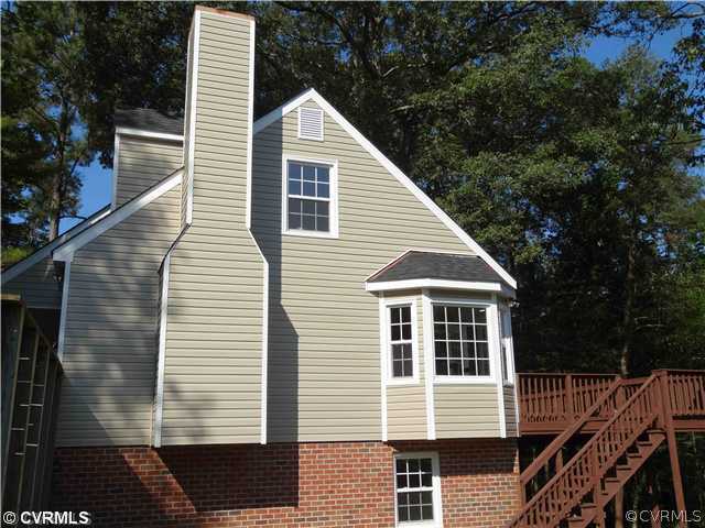 7312 Drexelbrook Road Chesterfield, VA 23832 - Photo 16 of 18 a view of a house with a yard