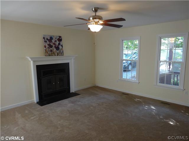 7312 Drexelbrook Road Chesterfield, VA 23832 - Photo 5 of 18 an empty room with windows and fan