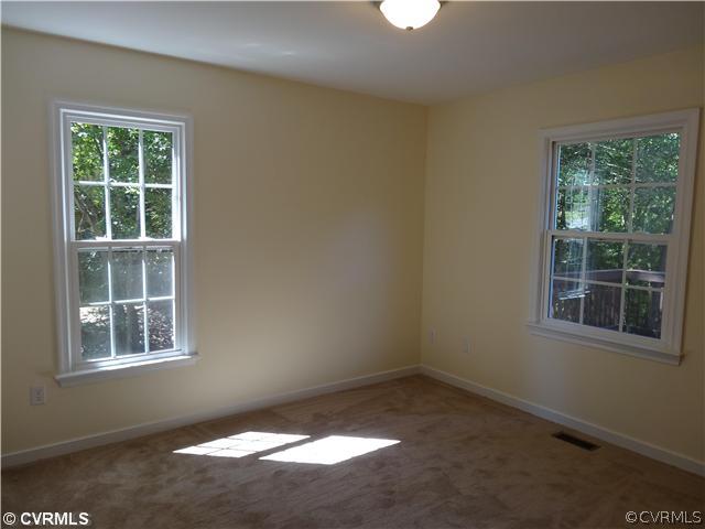 7312 Drexelbrook Road Chesterfield, VA 23832 - Photo 7 of 18 an empty room with a window