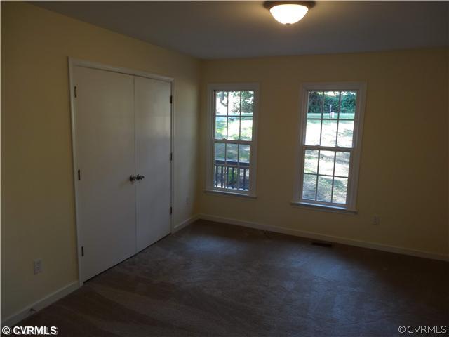 7312 Drexelbrook Road Chesterfield, VA 23832 - Photo 8 of 18 a view of an empty room with windows