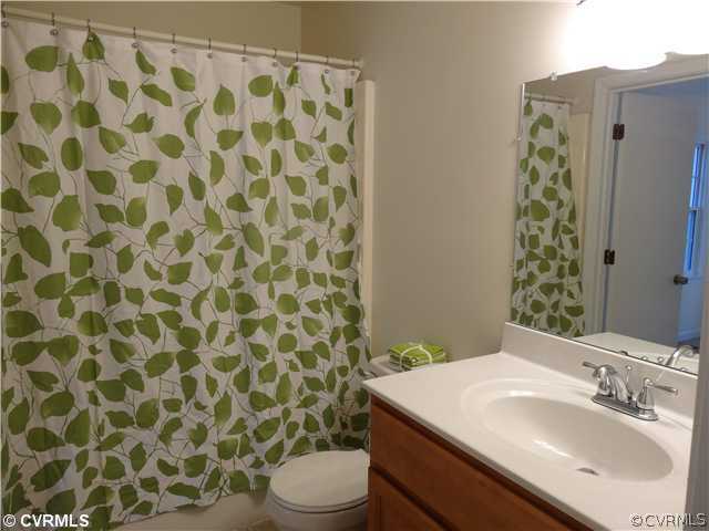7312 Drexelbrook Road Chesterfield, VA 23832 - Photo 9 of 18 a bathroom with a sink toilet and shower