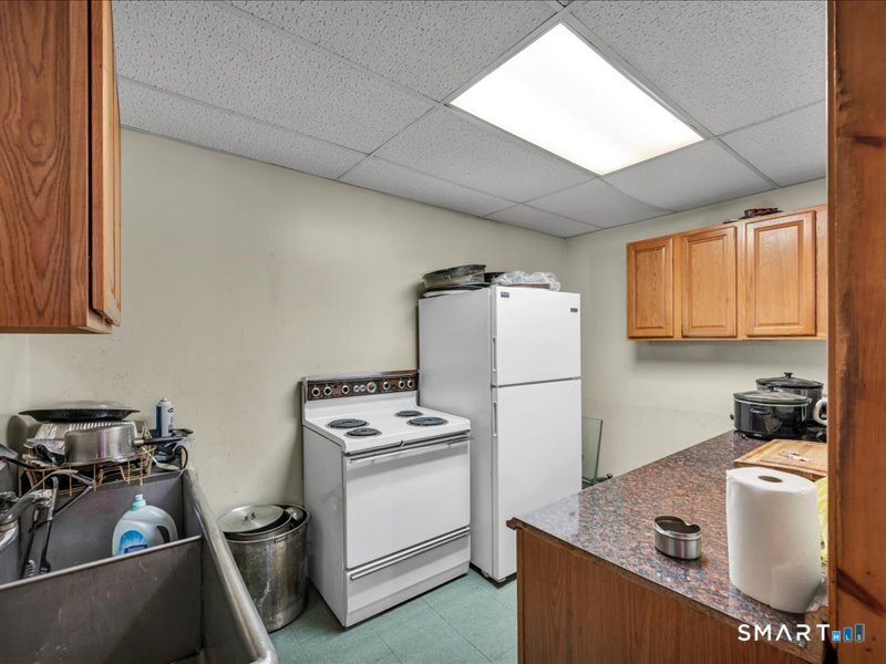 61 Maple Avenue Wallingford, CT 06492 - Photo 10 of 20 a room with storage and utility