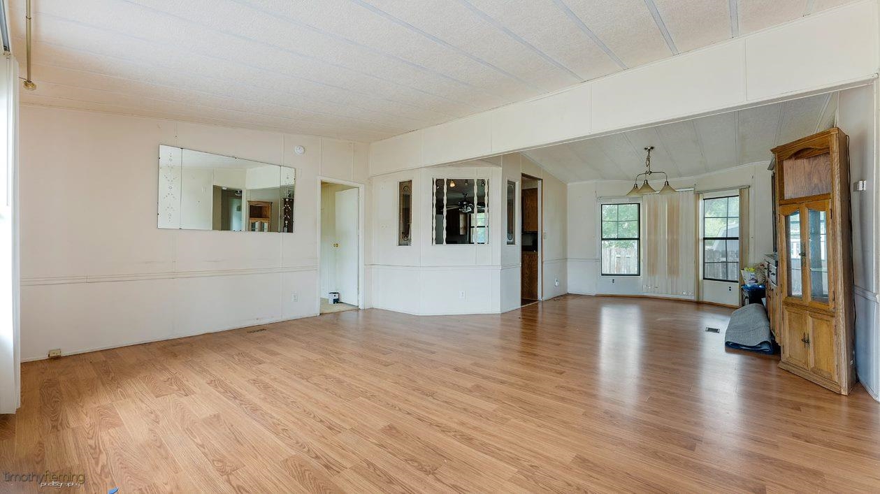 7 Denn Street Rio Grande, NJ 08242 - Photo 5 of 17 a view of an empty room with window and wooden floor