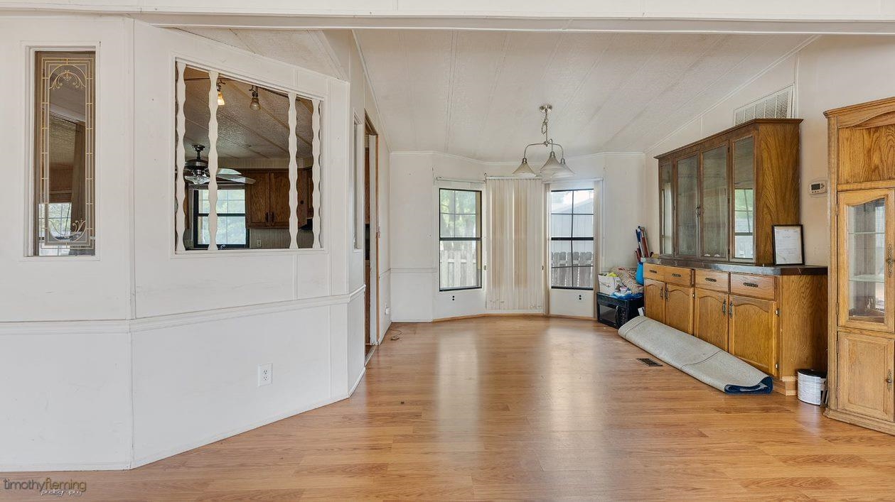 7 Denn Street Rio Grande, NJ 08242 - Photo 6 of 17 a view of a hallway with wooden floor and a kitchen