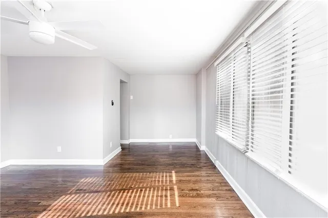 a view of an empty room and window