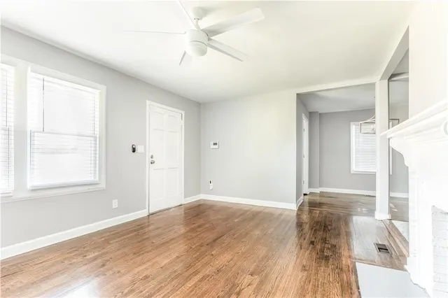 a view of livingroom with furniture wooden floor and window