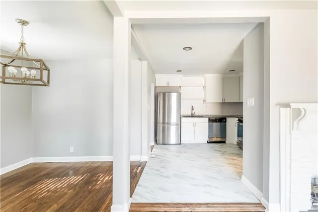 a view of a kitchen with windows