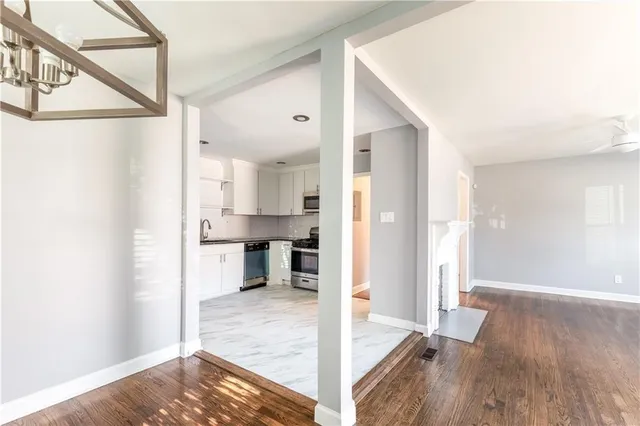 a view of a kitchen and dining room