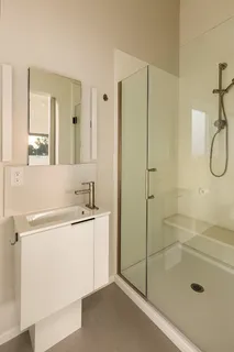 a kitchen with stainless steel appliances a refrigerator and a stove top oven