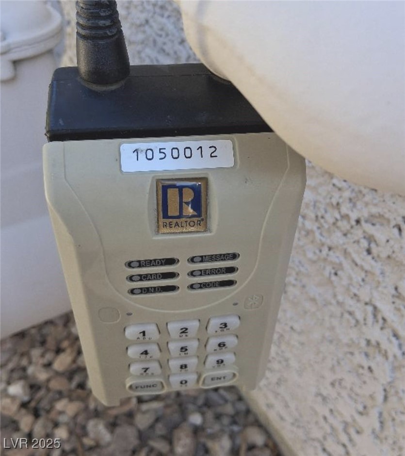 671 Anemone Lane Henderson, NV 89015 - Photo 7 of 7 Lockbox 1050012 located on gas meter lhs of garage area