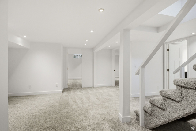 1187 East Ridgedale Circle Millcreek, UT 84106 - Photo 21 of 49 Carpeted lower level with recessed lighting, white walls, white trim, and white support columns