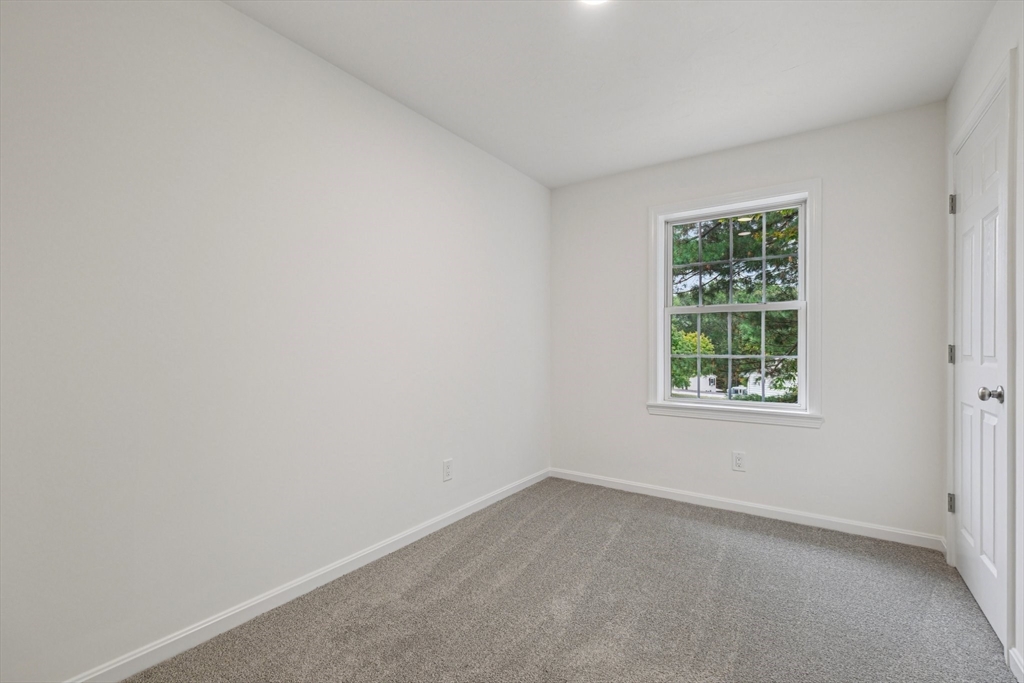 4 Hill Lane Shirley, MA 01464 - Photo 15 of 38 an empty room with a window