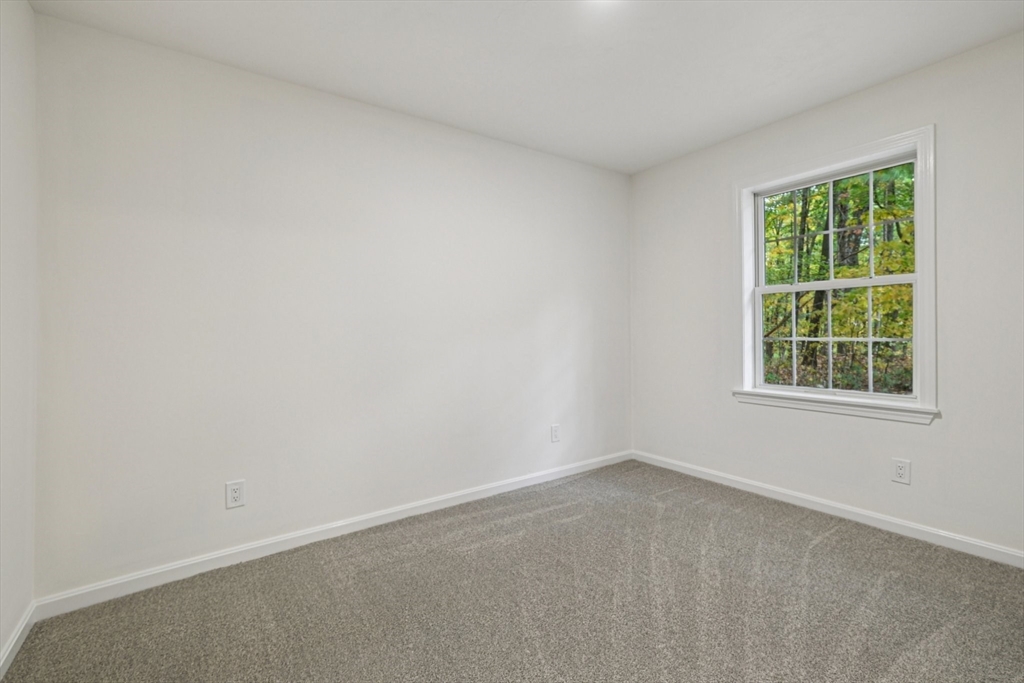 4 Hill Lane Shirley, MA 01464 - Photo 18 of 38 an empty room with a window