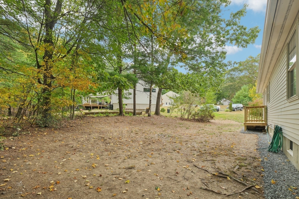 4 Hill Lane Shirley, MA 01464 - Photo 38 of 38 a view of a backyard with large trees