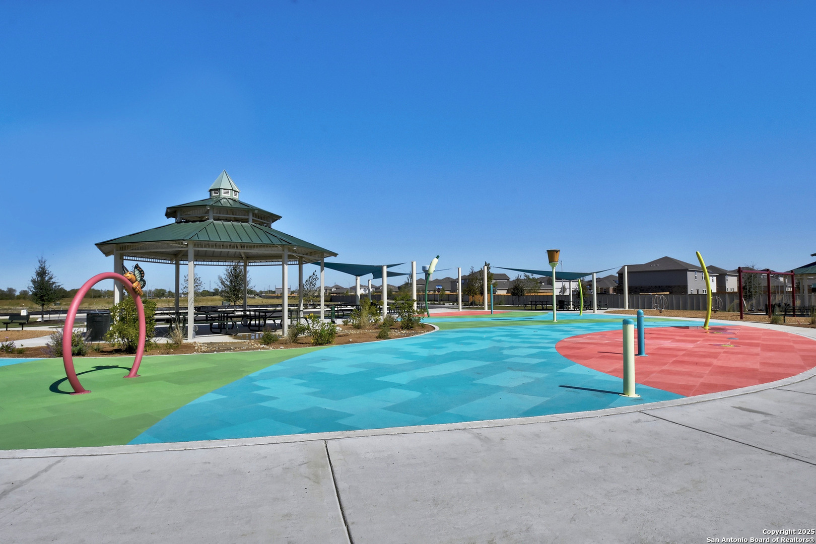 15211 Roebuck Canyon Von Ormy, TX 78073 - Photo 12 of 17 a view of a playground with basketball court