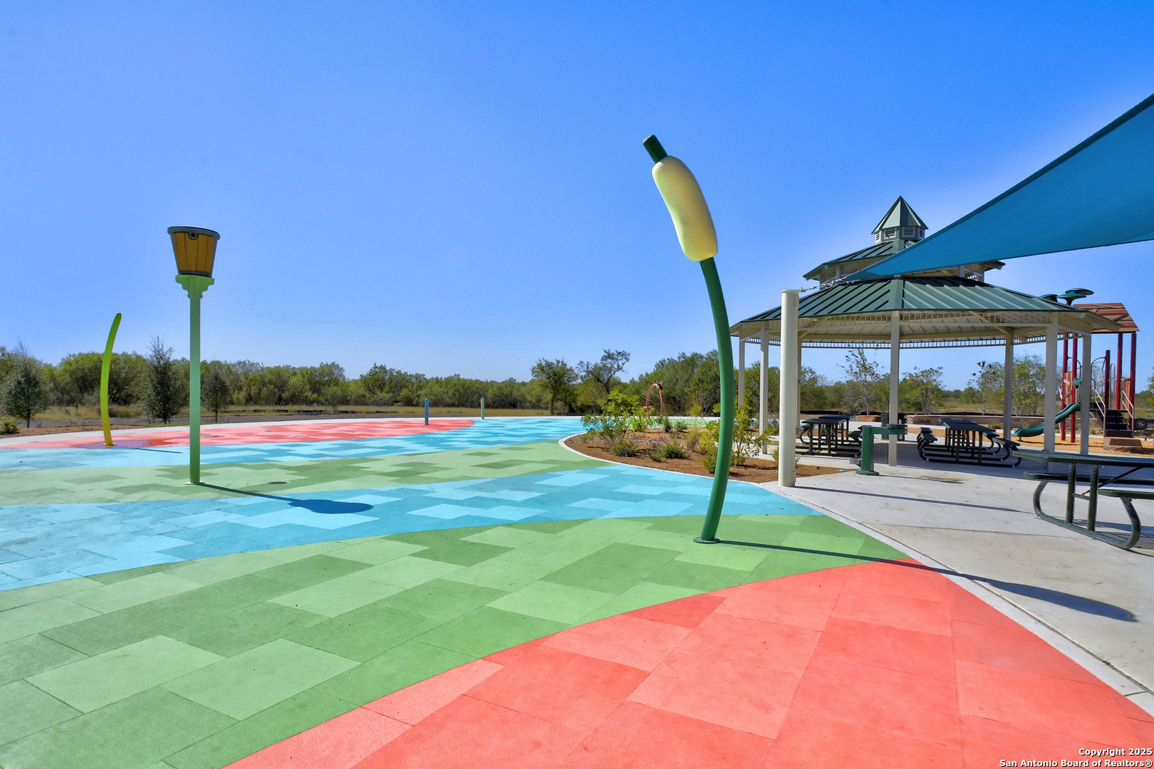 15211 Roebuck Canyon Von Ormy, TX 78073 - Photo 10 of 17 a view of a backyard with a slide