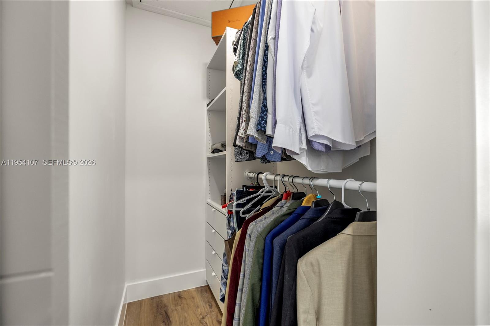 3910 Northeast 27th Terrace Lighthouse Point, FL 33064 - Photo 23 of 55 a view of walk in closet with clothes and shoes
