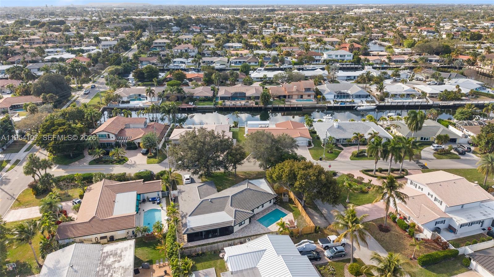 3910 Northeast 27th Terrace Lighthouse Point, FL 33064 - Photo 51 of 55 an aerial view of residential houses with outdoor space